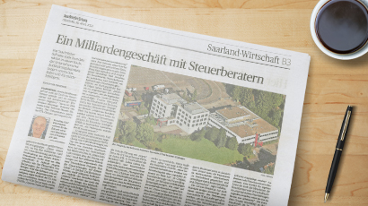 Saarbrücker Zeitung auf einem Schreibtisch mit eurodata Artikel